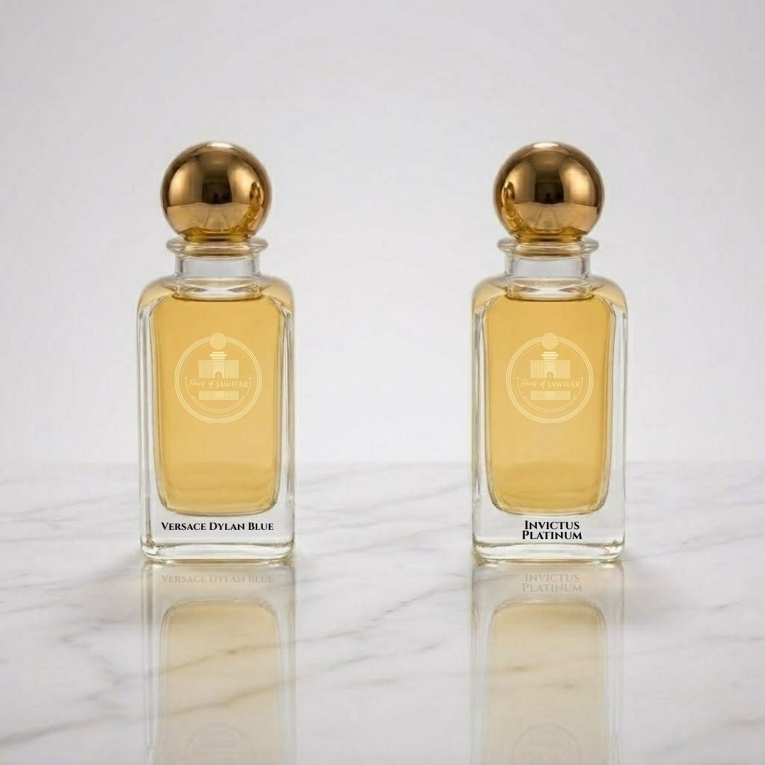 Versace Dylan Blue and Invictus Platinum parfum bottles by Haus Of Jawhar.