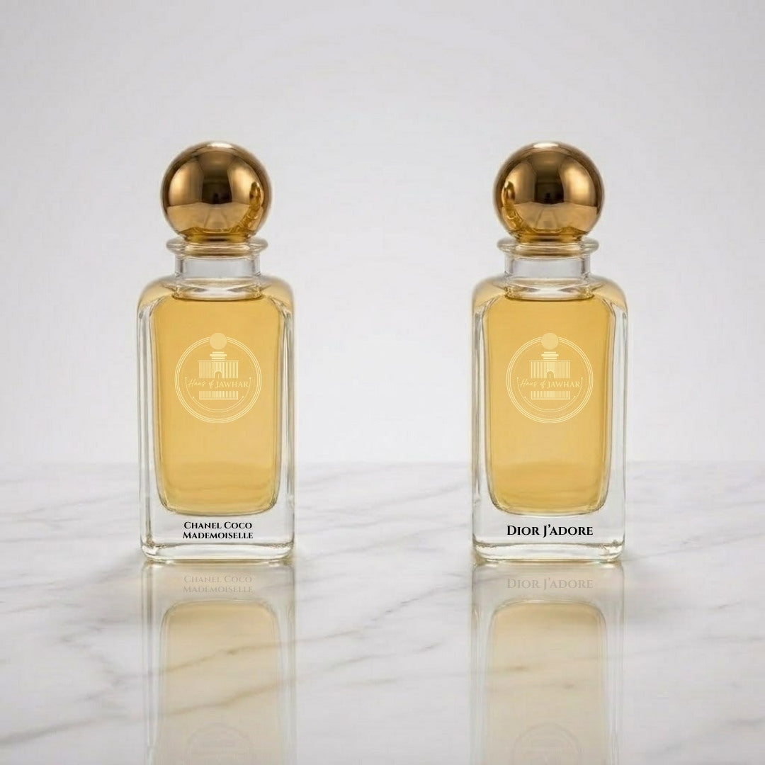 Chanel Coco Mademoiselle and Dior J'adore by Haus Of Jawhar perfume bottles.