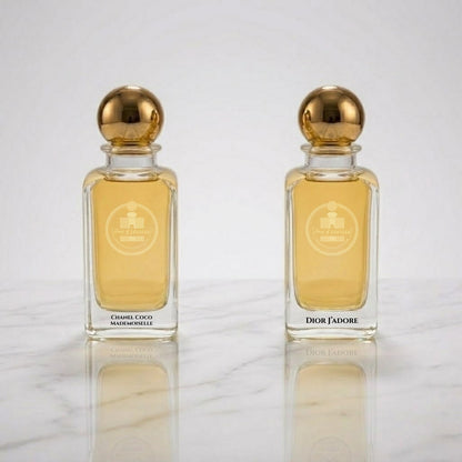 Chanel Coco Mademoiselle and Dior J'adore by Haus Of Jawhar perfume bottles.