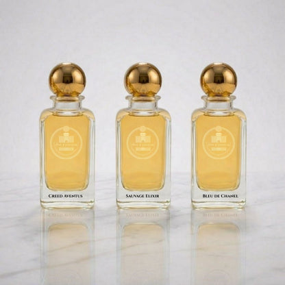 Haus Of Jawhar Creed Aventus, Sauvage Elixir, and Bleu de Chanel parfum bottles.