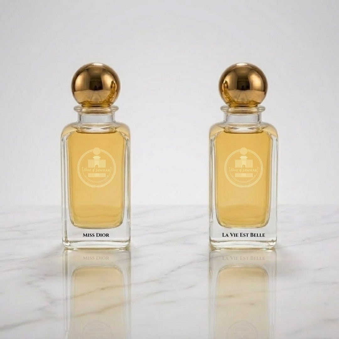 Miss Dior and La Vie Est Belle parfum bottles by Haus Of Jawhar.