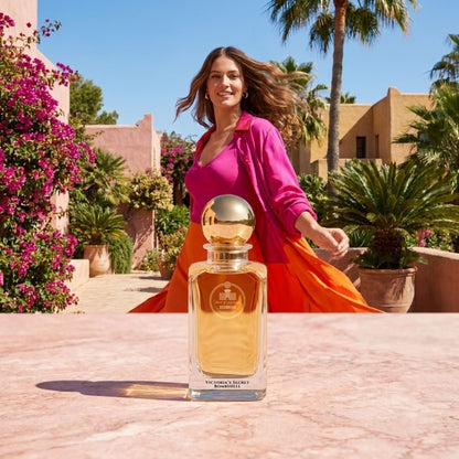 Haus Of Jawhar Victoria's Secret Bombshell perfume bottle in a luxury lifestyle setting.