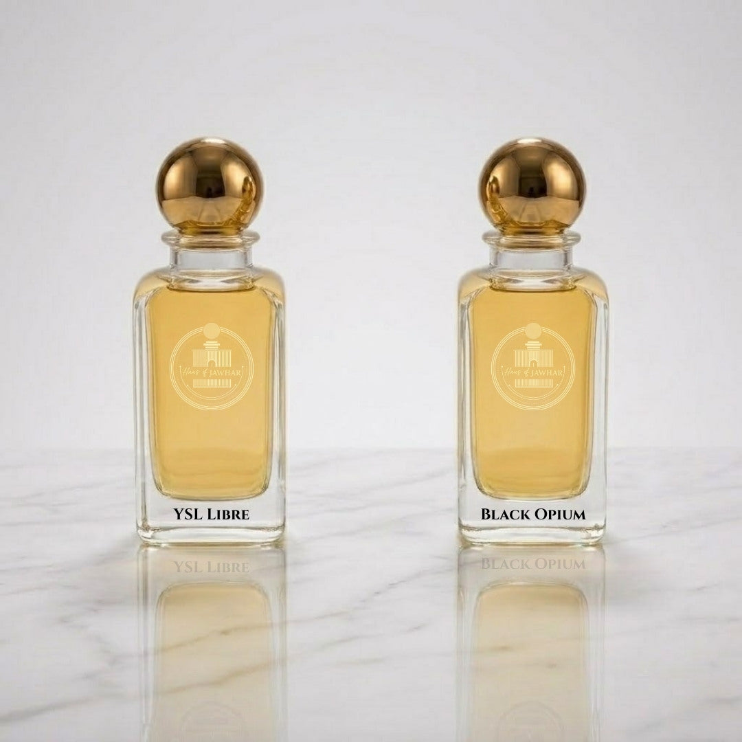 YSL Libre and Black Opium by Haus Of Jawhar perfume bottles.
